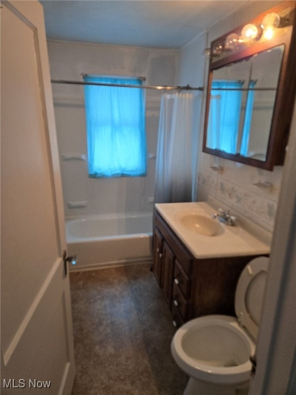 bathroom featuring vanity and shower / bath combination with curtain