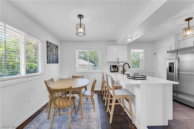 dining room with a healthy amount of sunlight