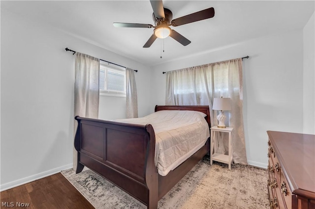 bedroom featuring ceiling fan and light hardwood / wood-style floors