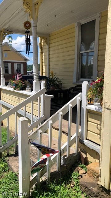 exterior space featuring covered porch