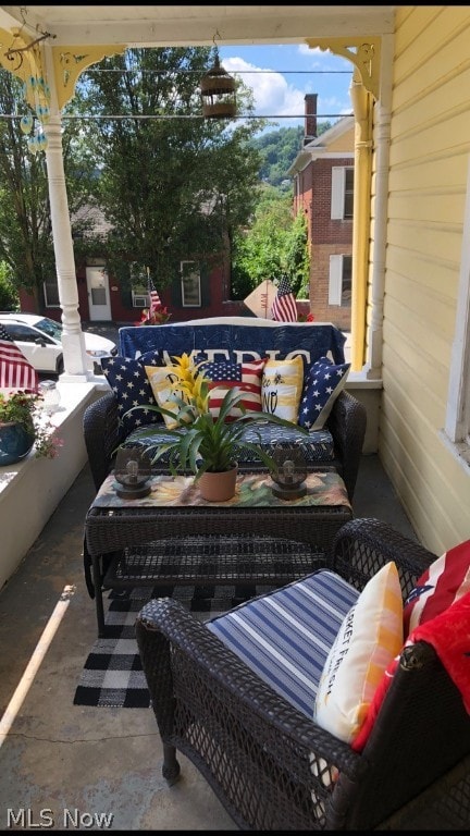 balcony featuring outdoor lounge area