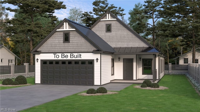 view of front of house featuring a garage and a front lawn