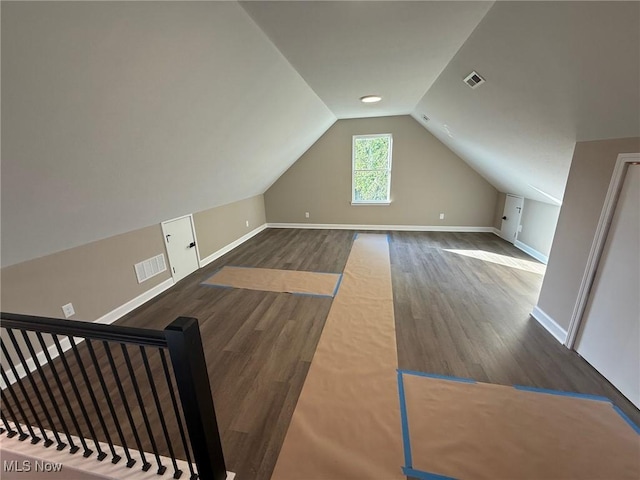 14501 Kennerdown Ave, Maple Heights, OH 44137 - additional living space featuring wood finished floors and vaulted ceiling