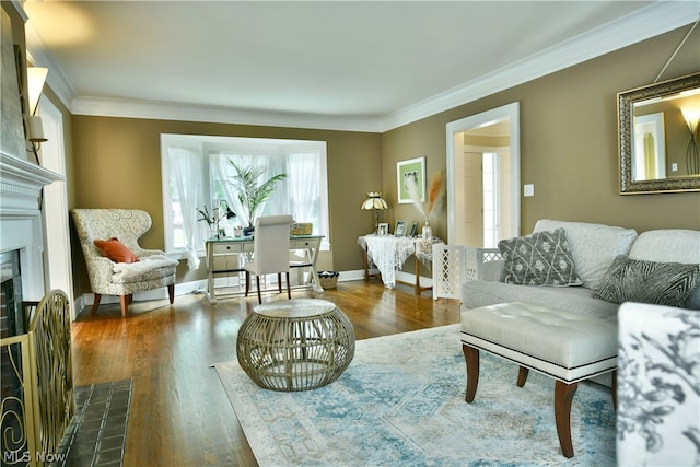 living room with crown molding and hardwood / wood-style flooring