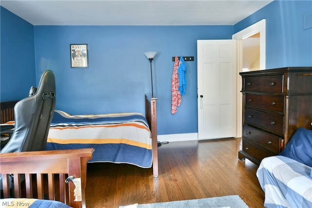 bedroom featuring wood-type flooring