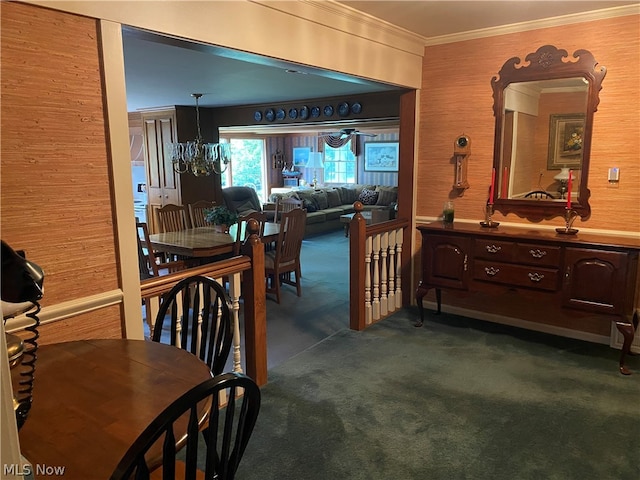 dining space featuring crown molding, wooden walls, a chandelier, and dark colored carpet