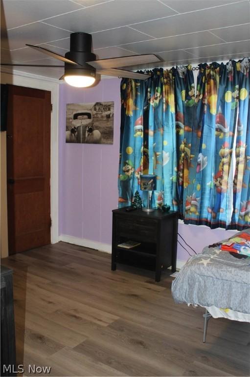 bedroom featuring hardwood / wood-style floors