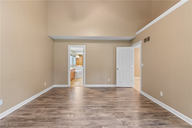 unfurnished room featuring wood-type flooring