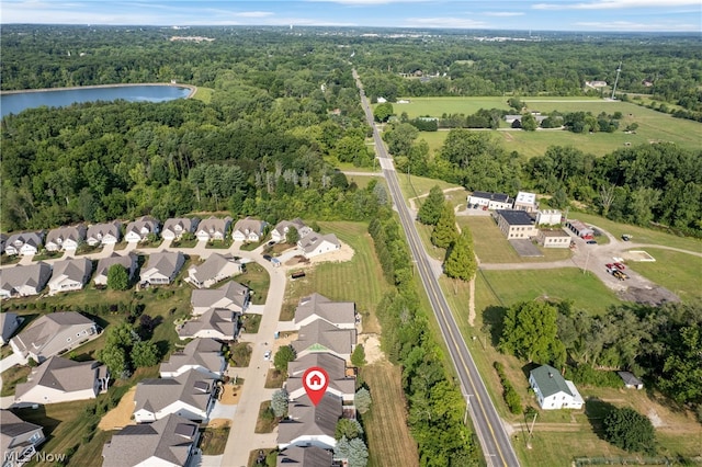 drone / aerial view featuring a water view