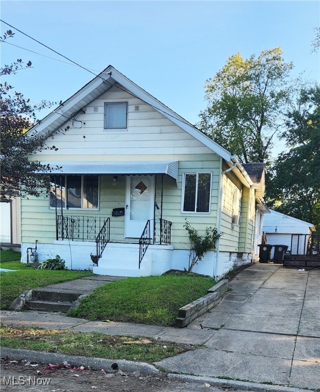 bungalow-style house featuring covered porch