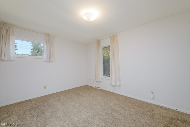 view of carpeted spare room