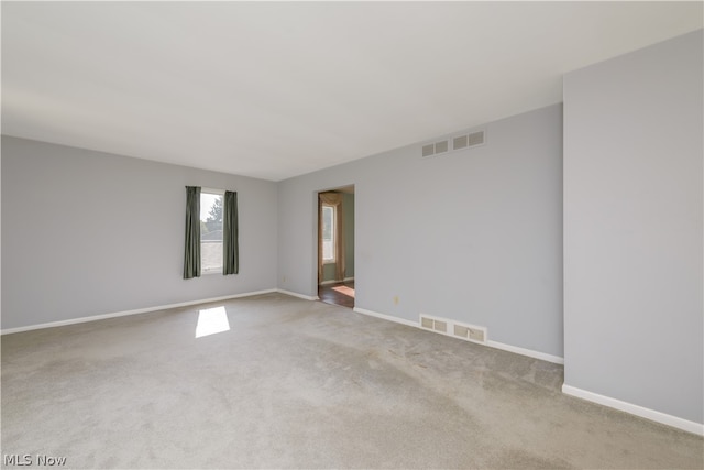 empty room featuring carpet flooring