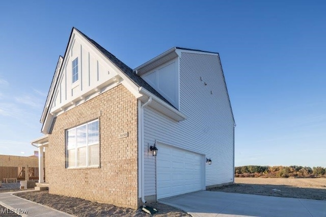 view of property exterior featuring a garage