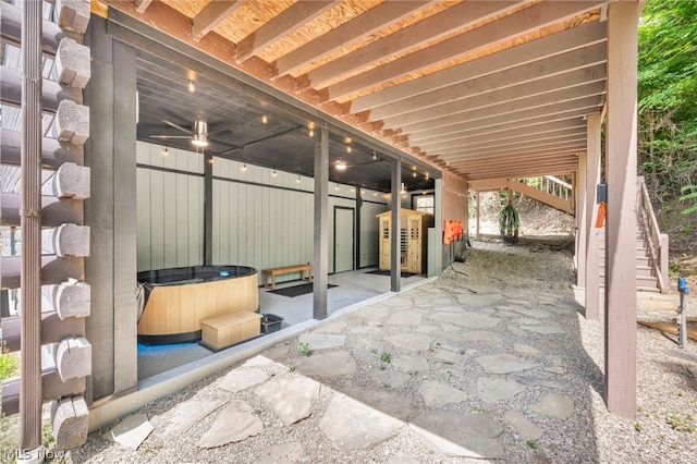 view of patio with a hot tub