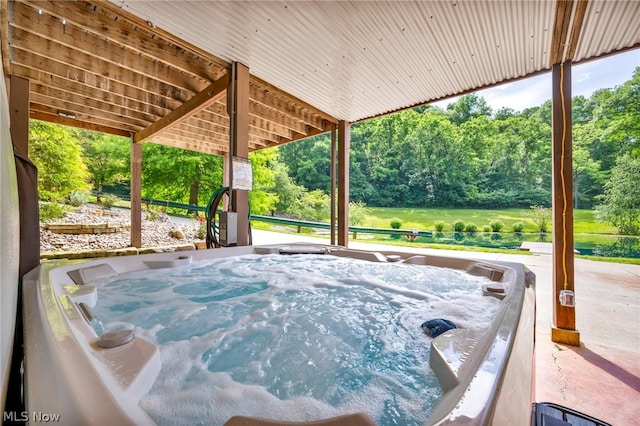 view of patio / terrace featuring a hot tub