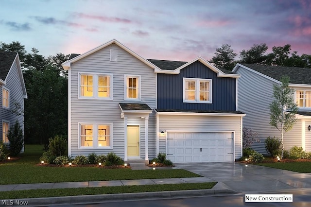 view of front of home with a garage