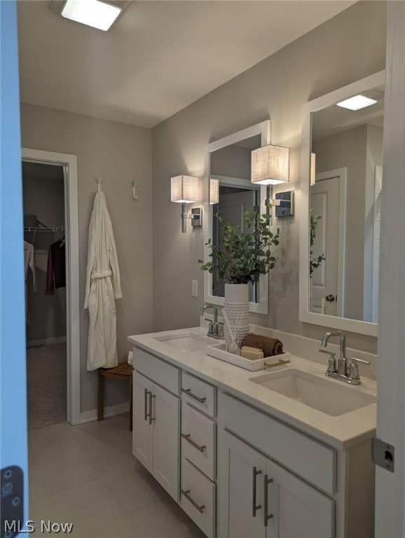 bathroom with vanity and tile patterned floors