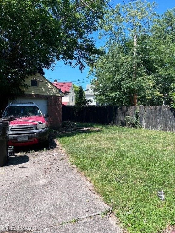 view of yard with a garage