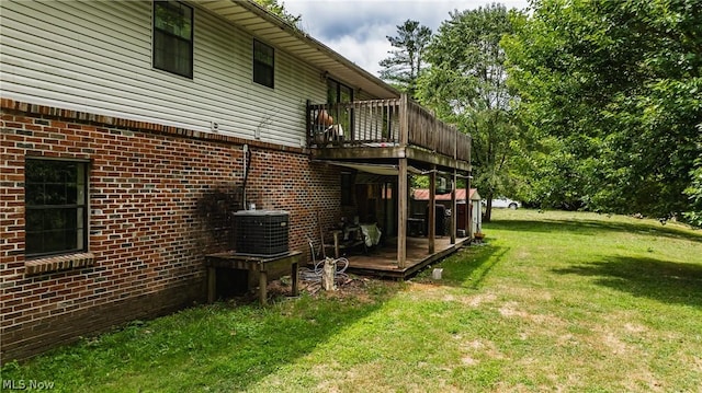 exterior space with a wooden deck and cooling unit