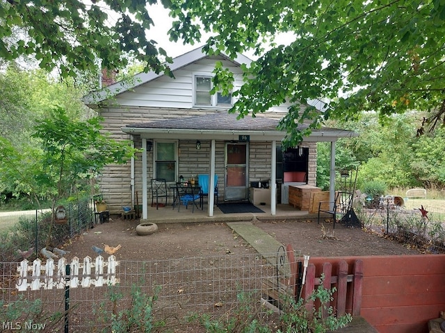 back of property featuring a patio