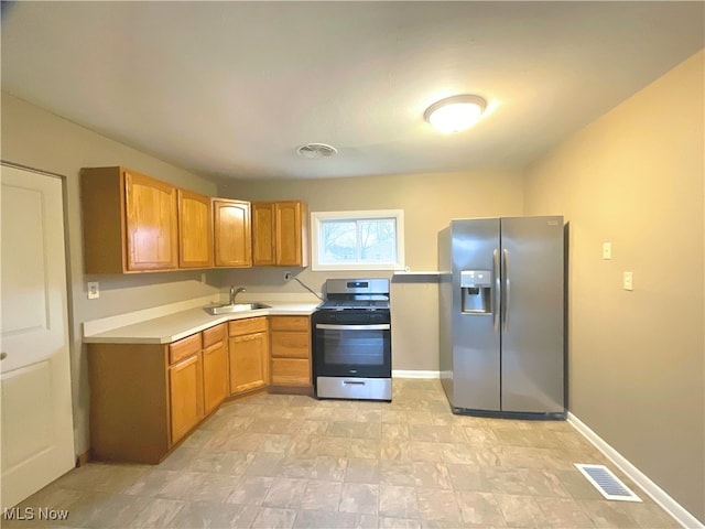 kitchen with stainless steel appliances and sink