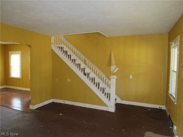 interior space with a textured ceiling