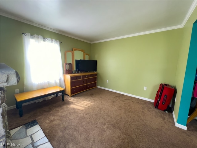 interior space featuring dark colored carpet and ornamental molding