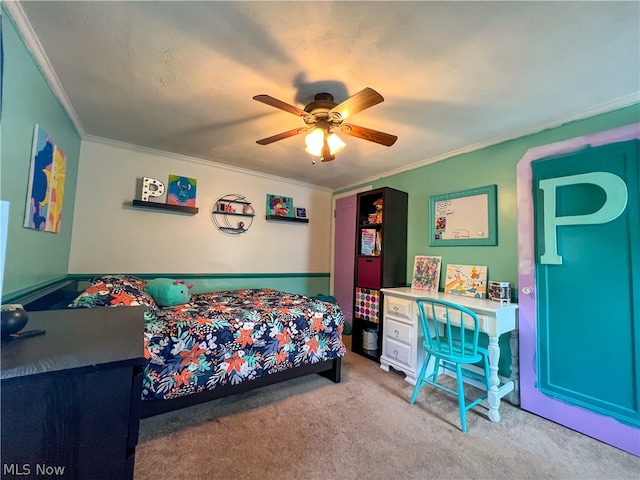 carpeted bedroom featuring a textured ceiling, ceiling fan, and crown molding