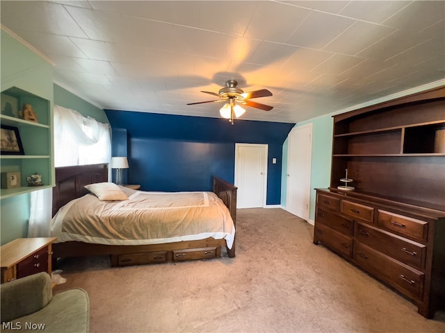 bedroom with light colored carpet and ceiling fan