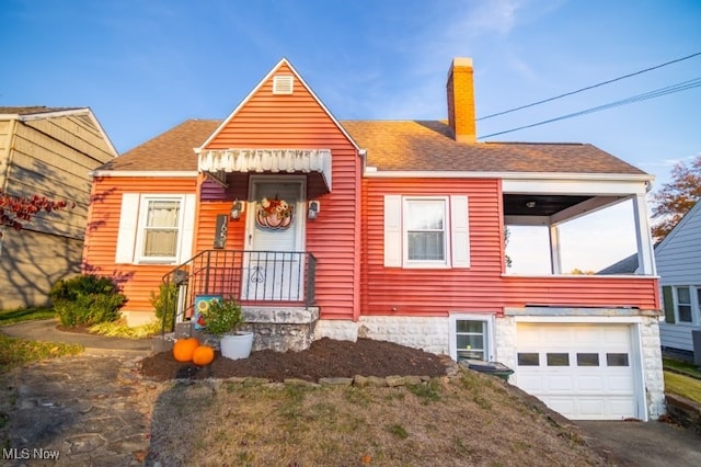 view of front of property with a garage