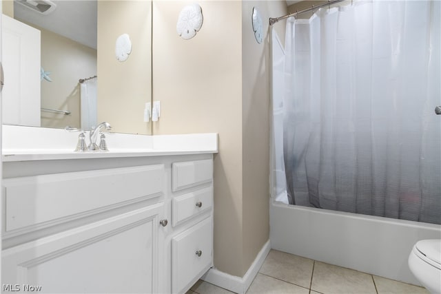 full bathroom with shower / tub combo, tile patterned floors, toilet, and vanity