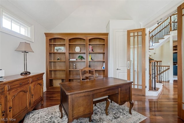 office area featuring dark wood-type flooring and vaulted ceiling