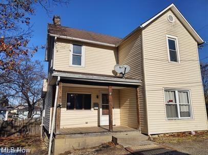 view of property with a porch