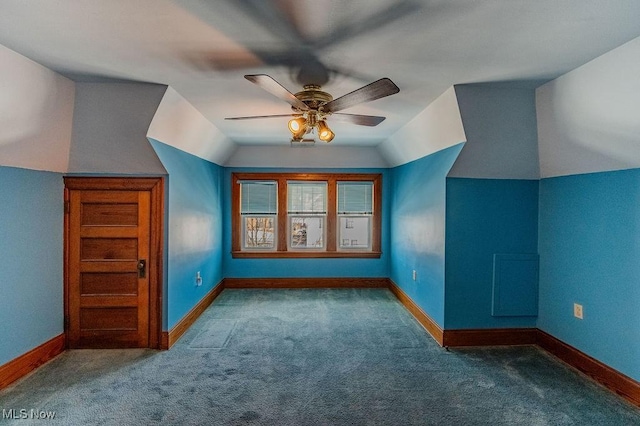 bonus room featuring ceiling fan, lofted ceiling, and carpet floors