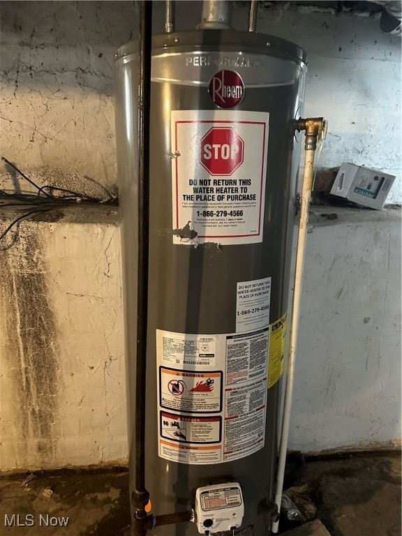 utility room with water heater