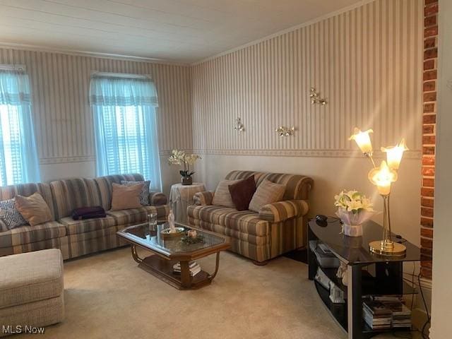 carpeted living room featuring ornamental molding