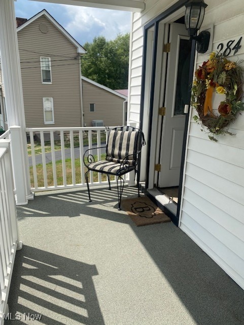 balcony featuring covered porch