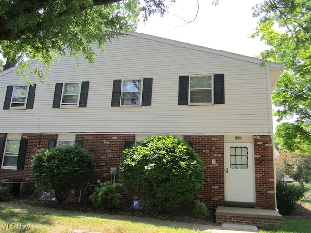 view of front of property featuring central AC unit