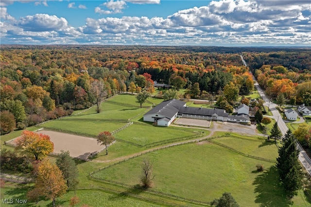 birds eye view of property with a rural view