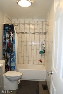 full bathroom with vanity, toilet, and shower / bath combination with curtain