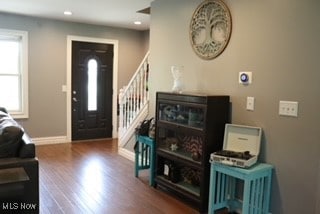 foyer entrance with hardwood / wood-style flooring