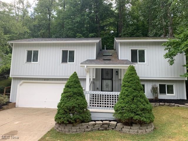 split level home featuring a garage