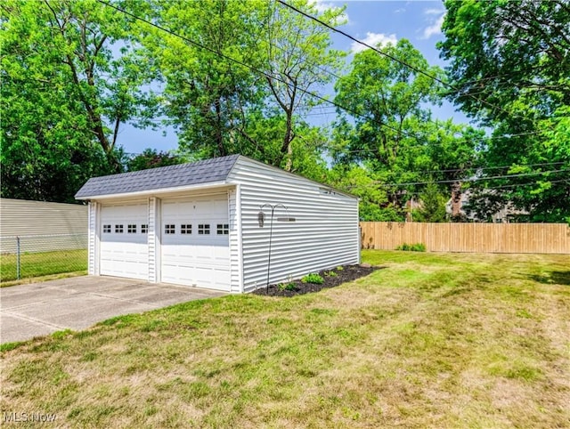 detached garage with fence