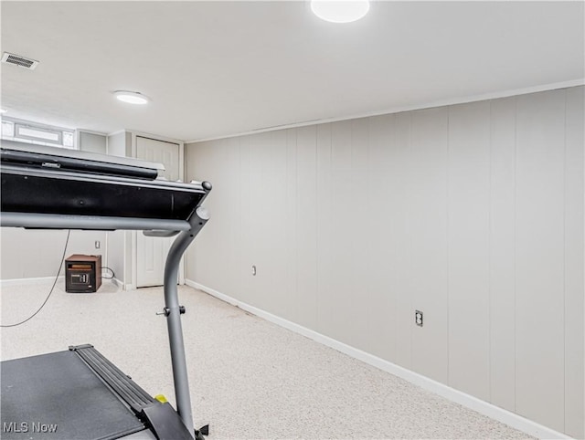 exercise room featuring visible vents