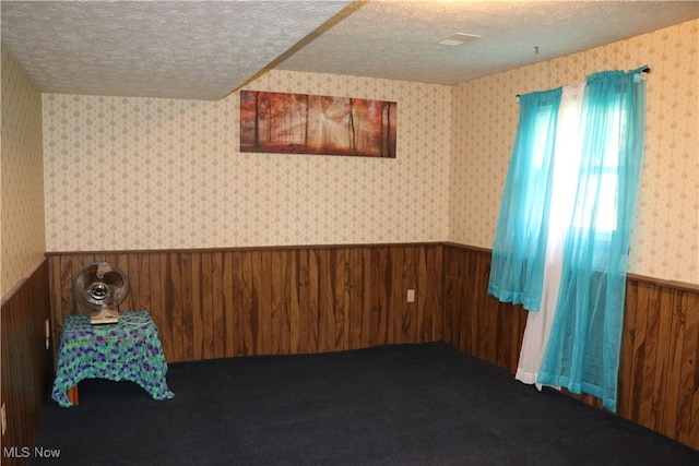 interior space with a textured ceiling