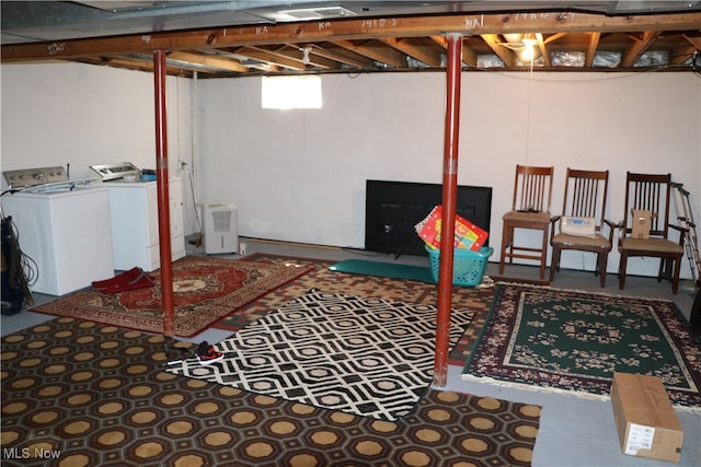 basement featuring washing machine and dryer