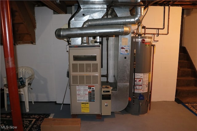 utility room with water heater