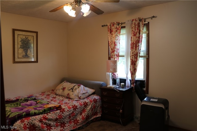 carpeted bedroom featuring ceiling fan