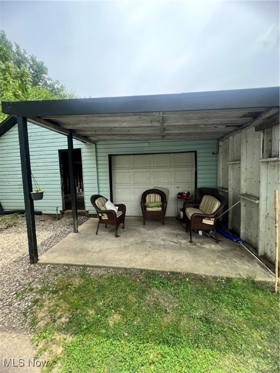 exterior space with a garage and an outdoor structure