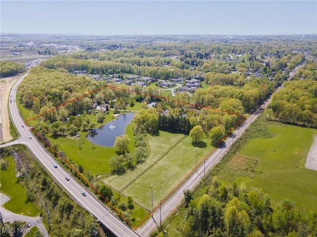 bird's eye view featuring a rural view and a water view